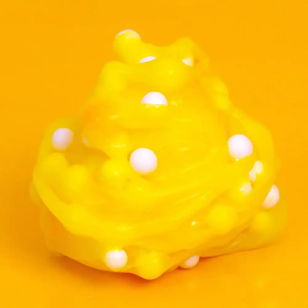 Play-Doh | Bubble Super Stretch Banana Bonanza Slime | slide 4